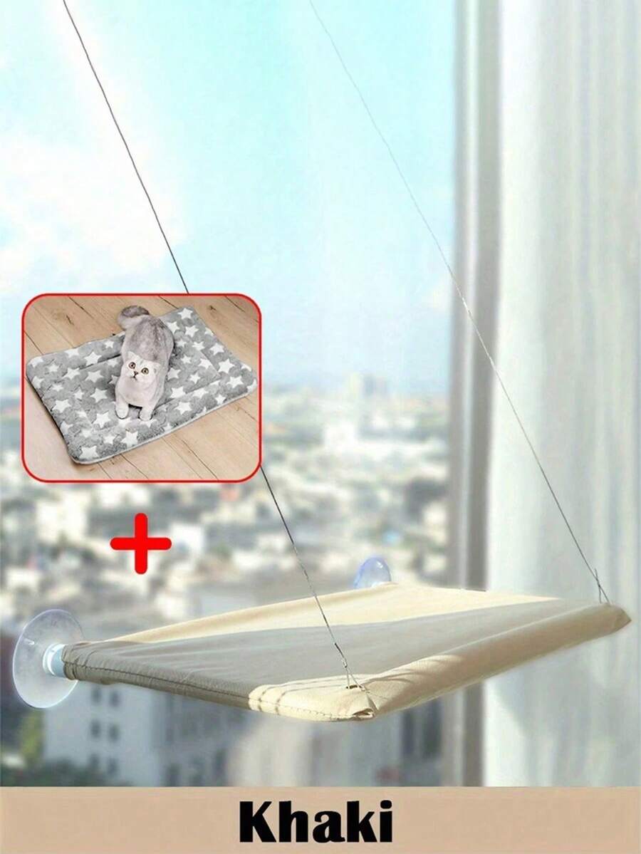 Multicolor hanging cat window hammock bed with cozy blanket mounted on a sunny window seat.