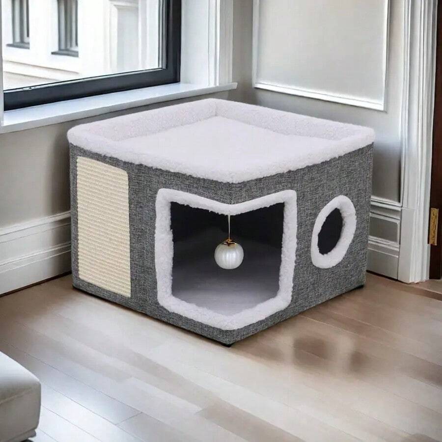 Grey foldable indoor cat house bed featuring a large entry hole, round side window, double-sided soft cushion, and an attached fluffy play ball.