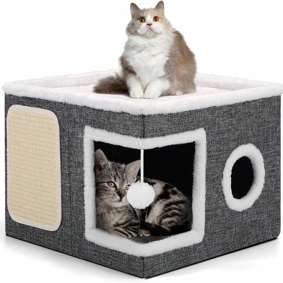 Grey foldable indoor cat house bed featuring a large entry hole, round side window, double-sided soft cushion, and an attached fluffy play ball.