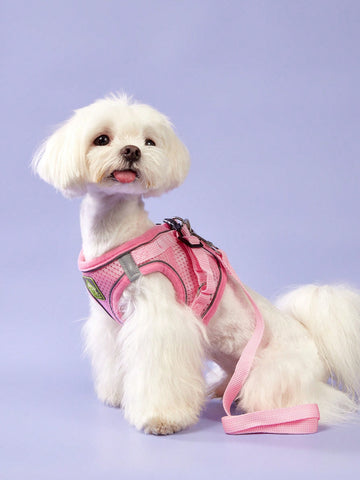 Pink reflective mesh vest-style pet harness with leash for cats and dogs, featuring adjustable chest and back straps for comfortable outdoor walking.