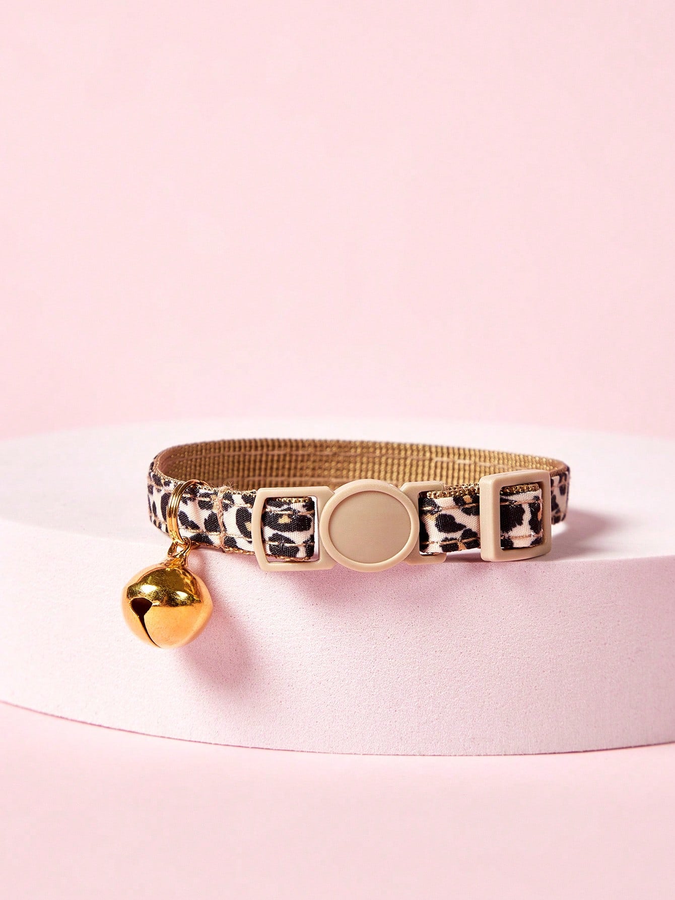 Leopard print adjustable cat collar with golden bell for cats and small pets, made from multicolor polyester.