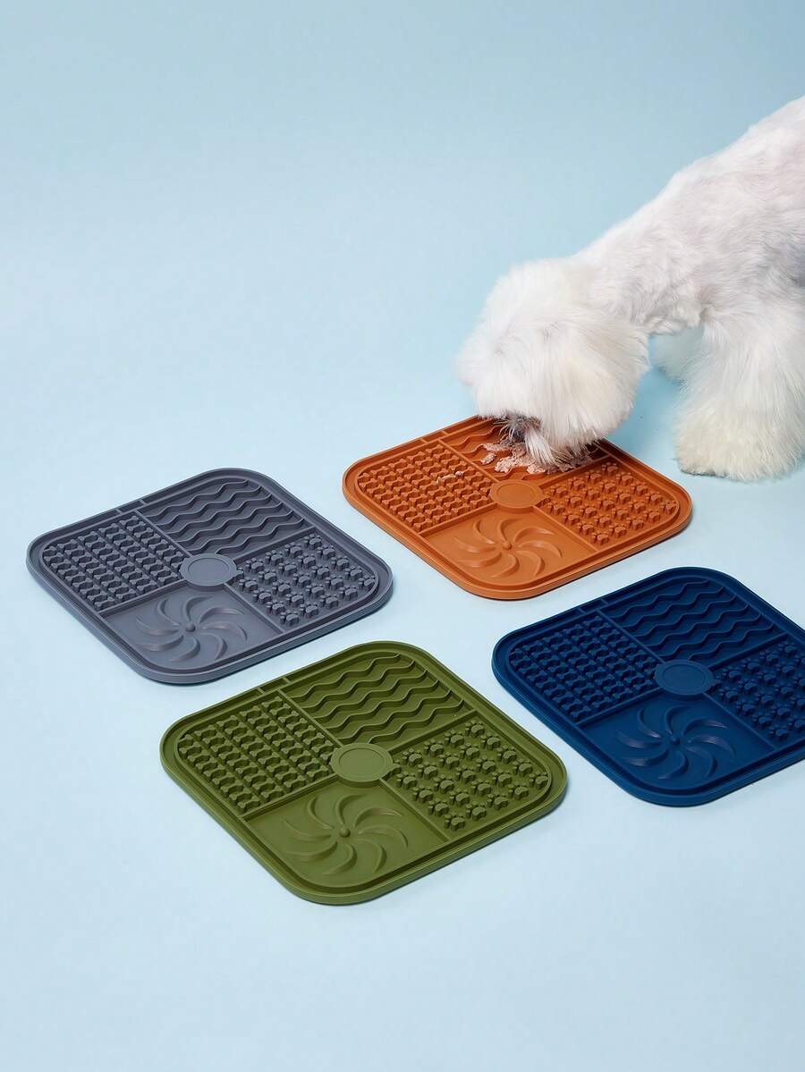 Multicolor square silicone dog lick mat featuring textured slow feeder patterns and suction cups.