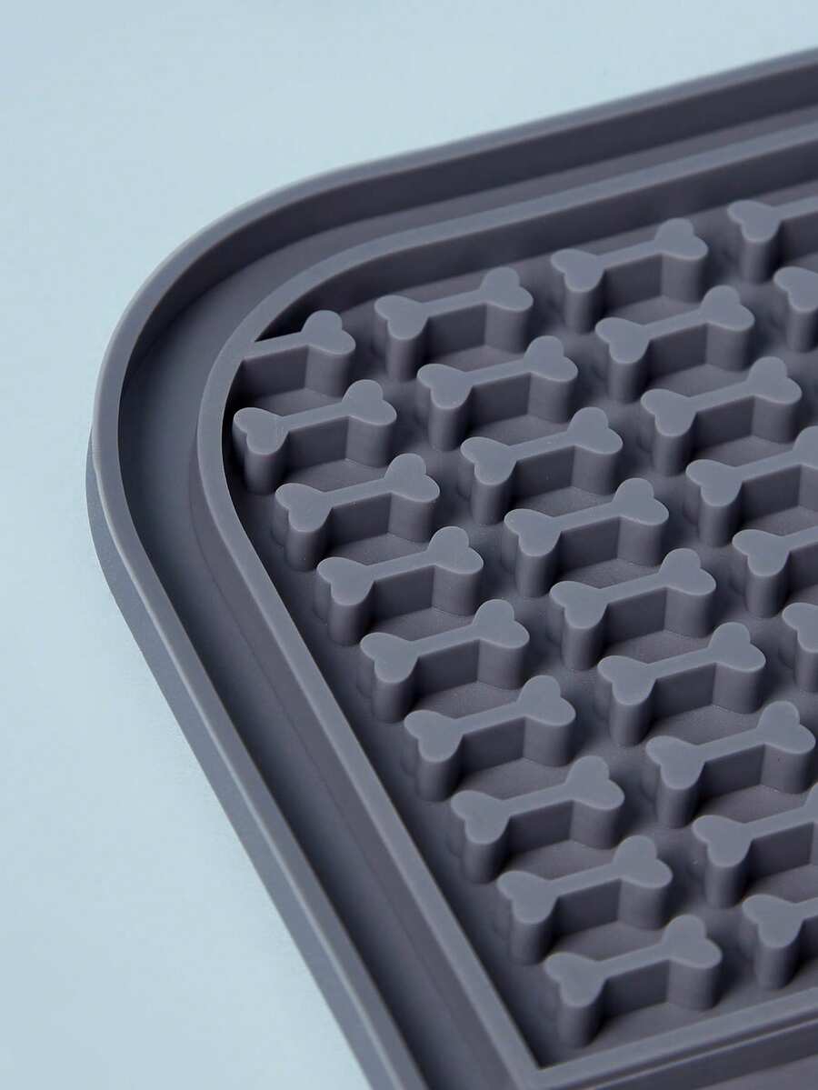 Multicolor square silicone dog lick mat featuring textured slow feeder patterns and suction cups.