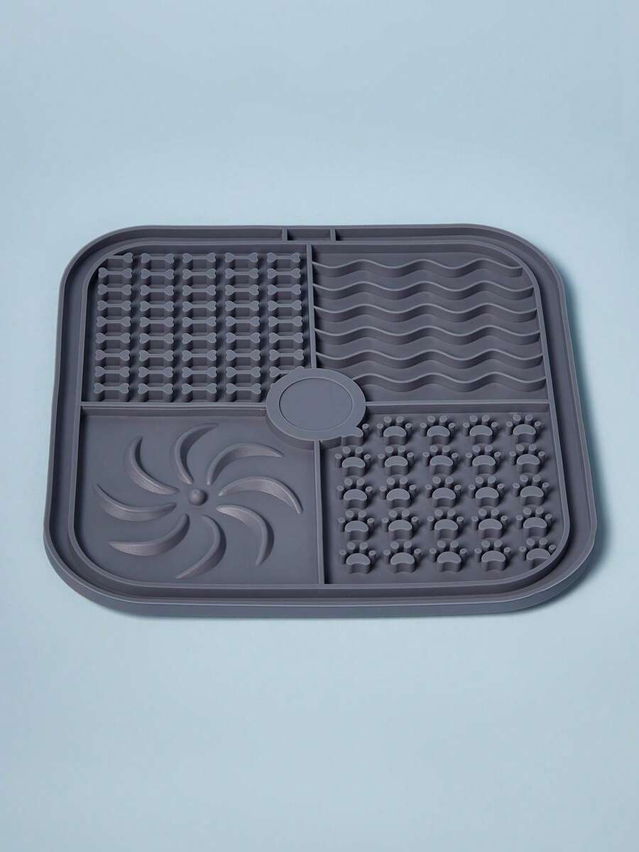 Multicolor square silicone dog lick mat featuring textured slow feeder patterns and suction cups.