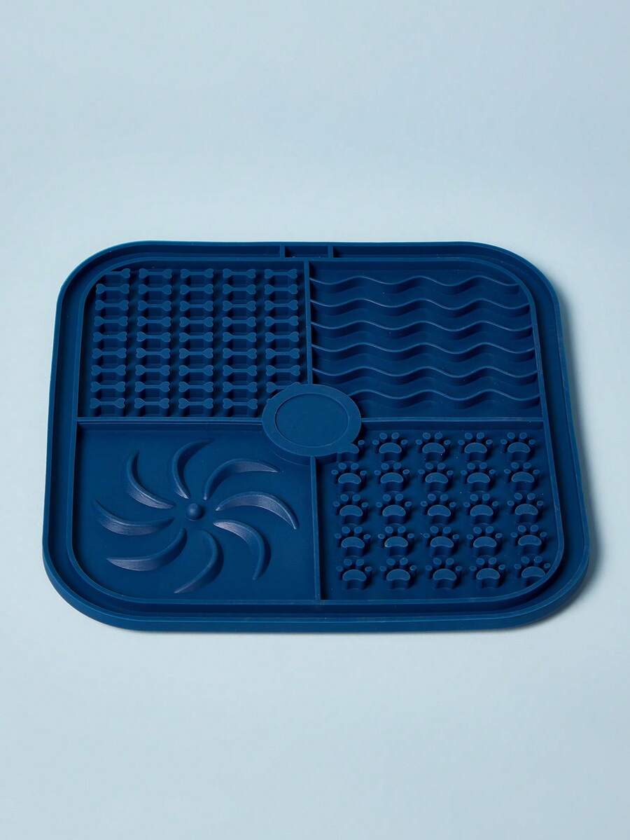 Multicolor square silicone dog lick mat featuring textured slow feeder patterns and suction cups.