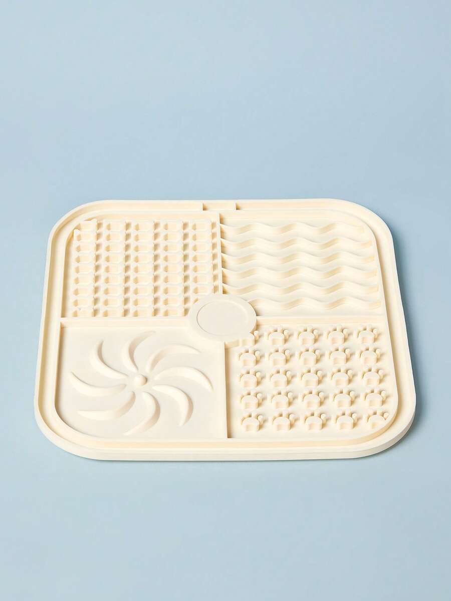 Multicolor square silicone dog lick mat featuring textured slow feeder patterns and suction cups.