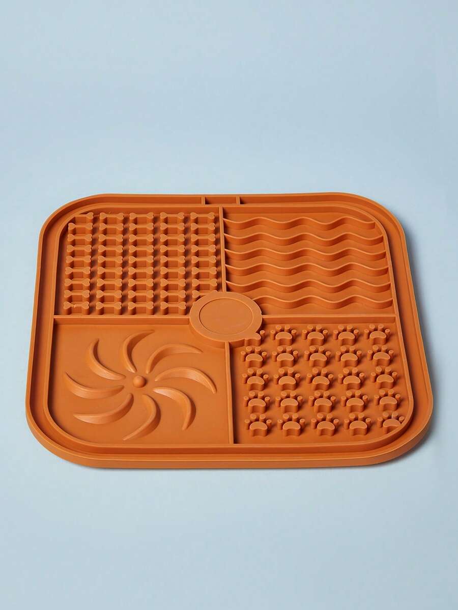 Multicolor square silicone dog lick mat featuring textured slow feeder patterns and suction cups.