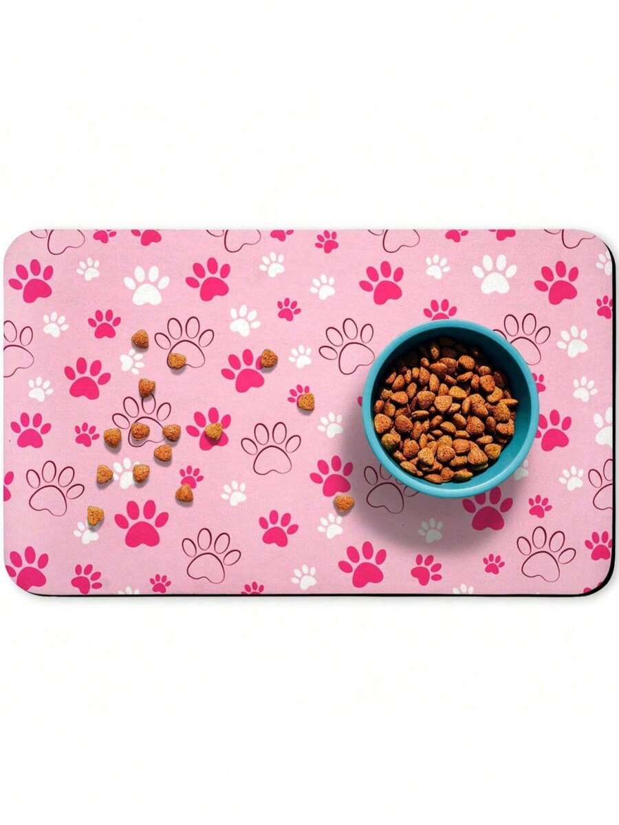 Black and white cartoon diatomite pet feeding mat placed under dog and cat food and water bowls to catch spills.