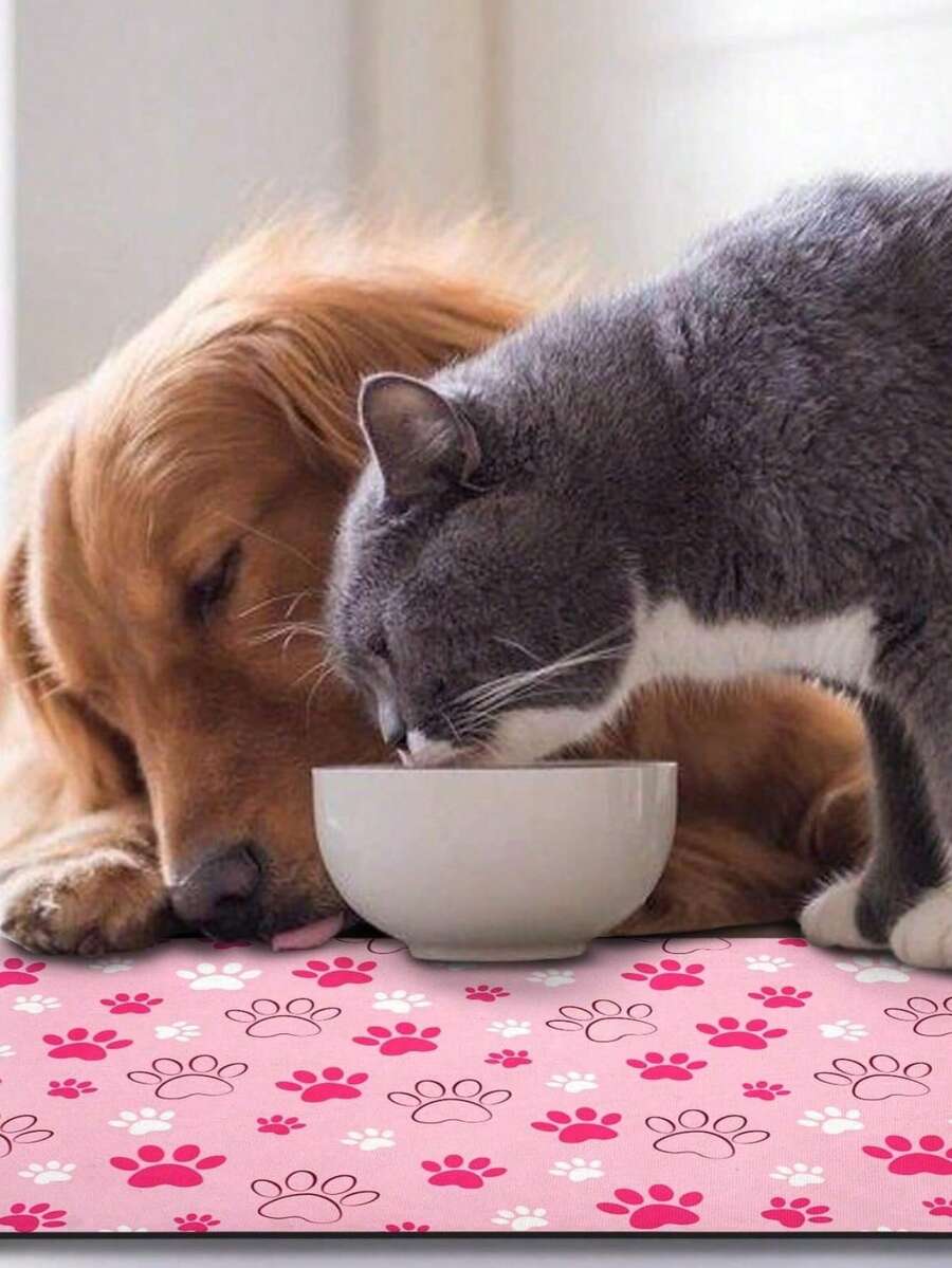 Black and white cartoon diatomite pet feeding mat placed under dog and cat food and water bowls to catch spills.