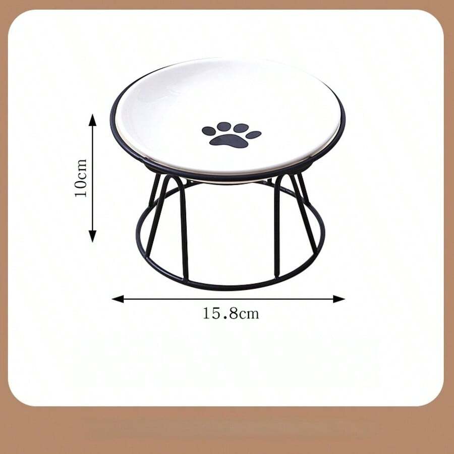 White elevated ceramic pet bowl set with non-slip stand featuring cat paw and fishbone designs