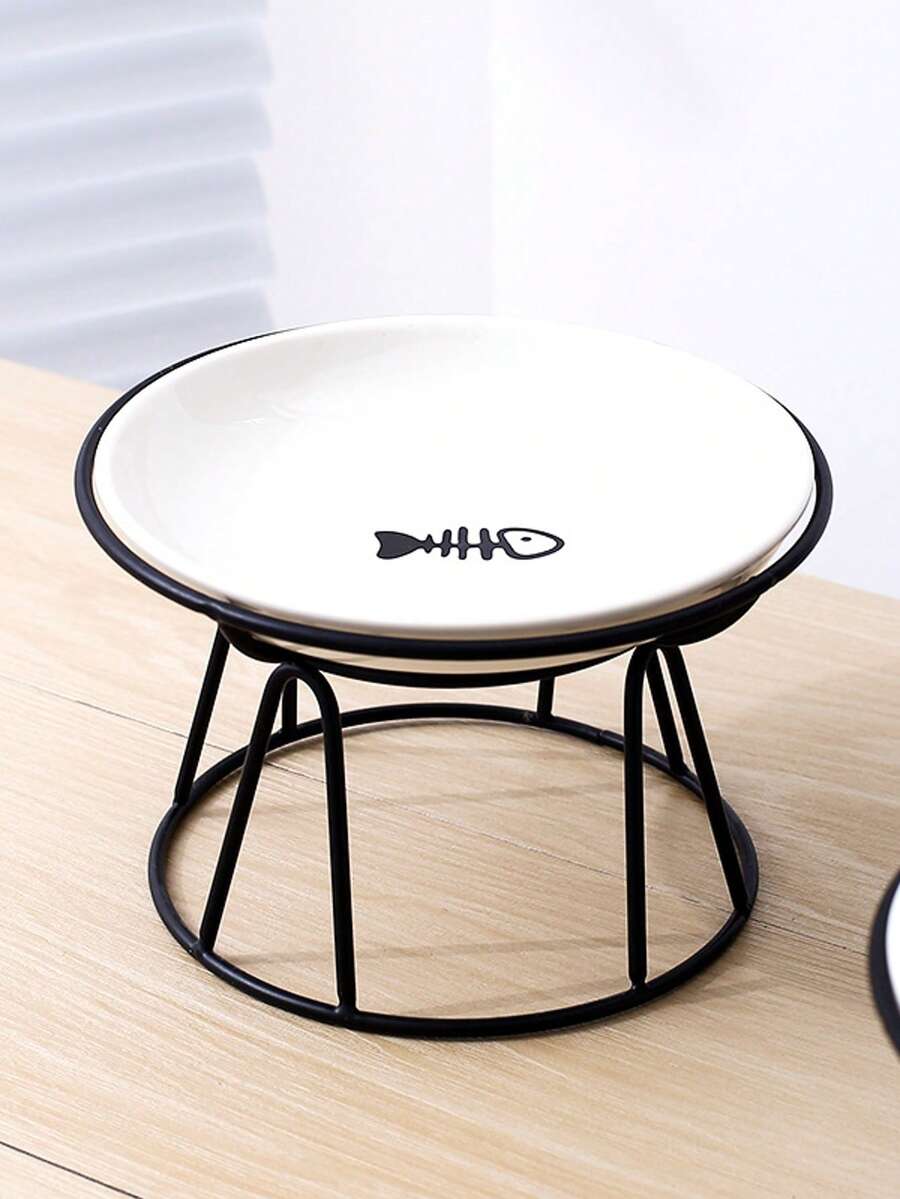 White elevated ceramic pet bowl set with non-slip stand featuring cat paw and fishbone designs