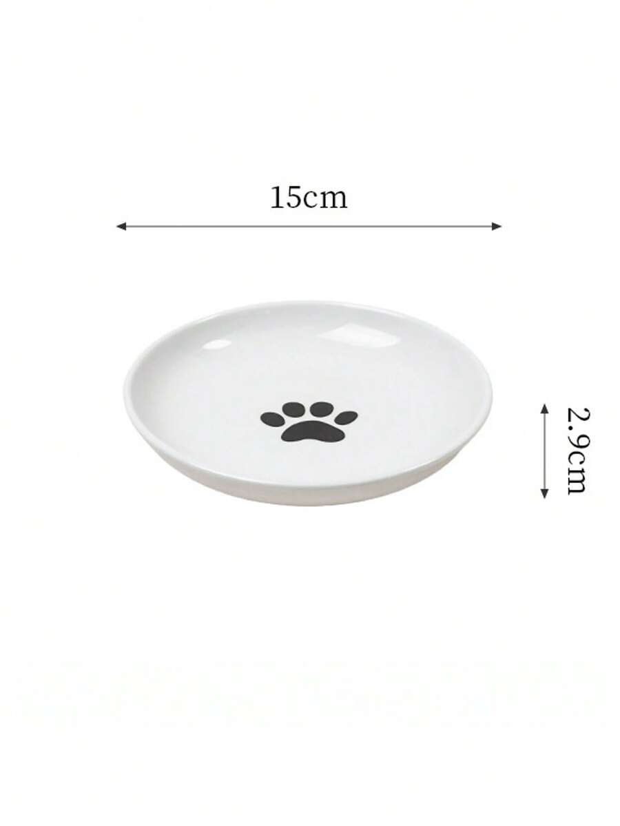White elevated ceramic pet bowl set with non-slip stand featuring cat paw and fishbone designs