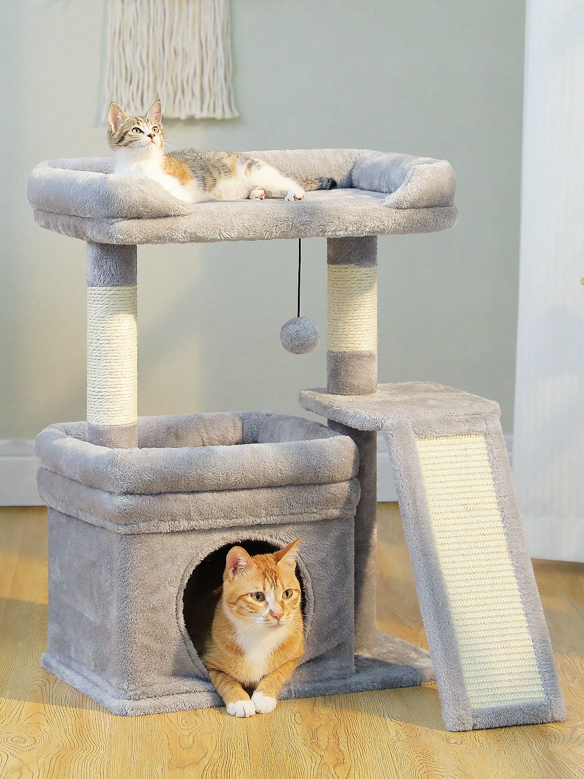 Small vintage cat tree tower for indoor cats featuring a cozy cushioned top perch, soft cat condo, natural sisal scratching posts, and a scratching ladder.