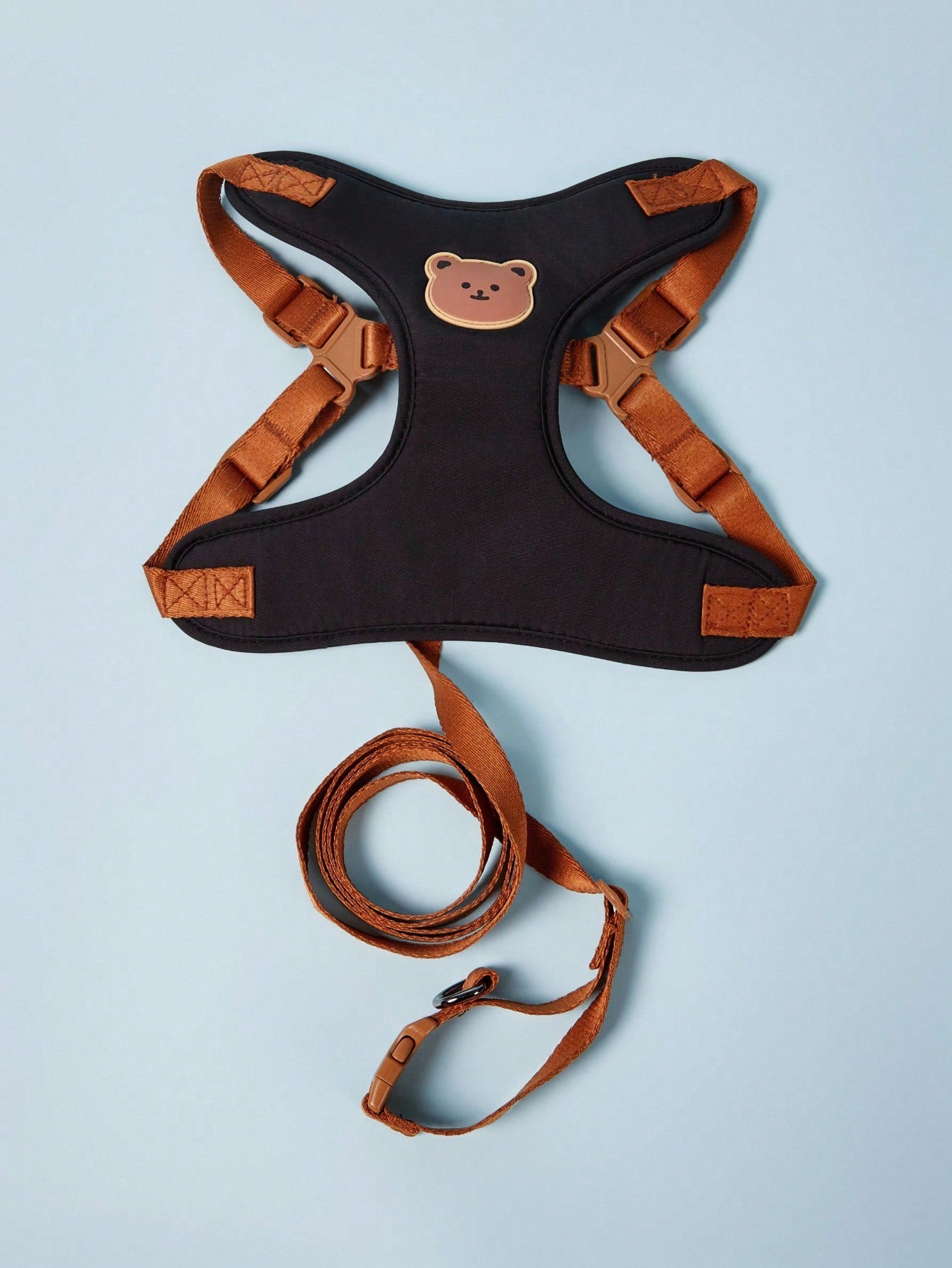 Black polyester dog harness and leash set with cute bear animal cartoon design for small breed dogs such as poodles, suitable for outdoor walks.
