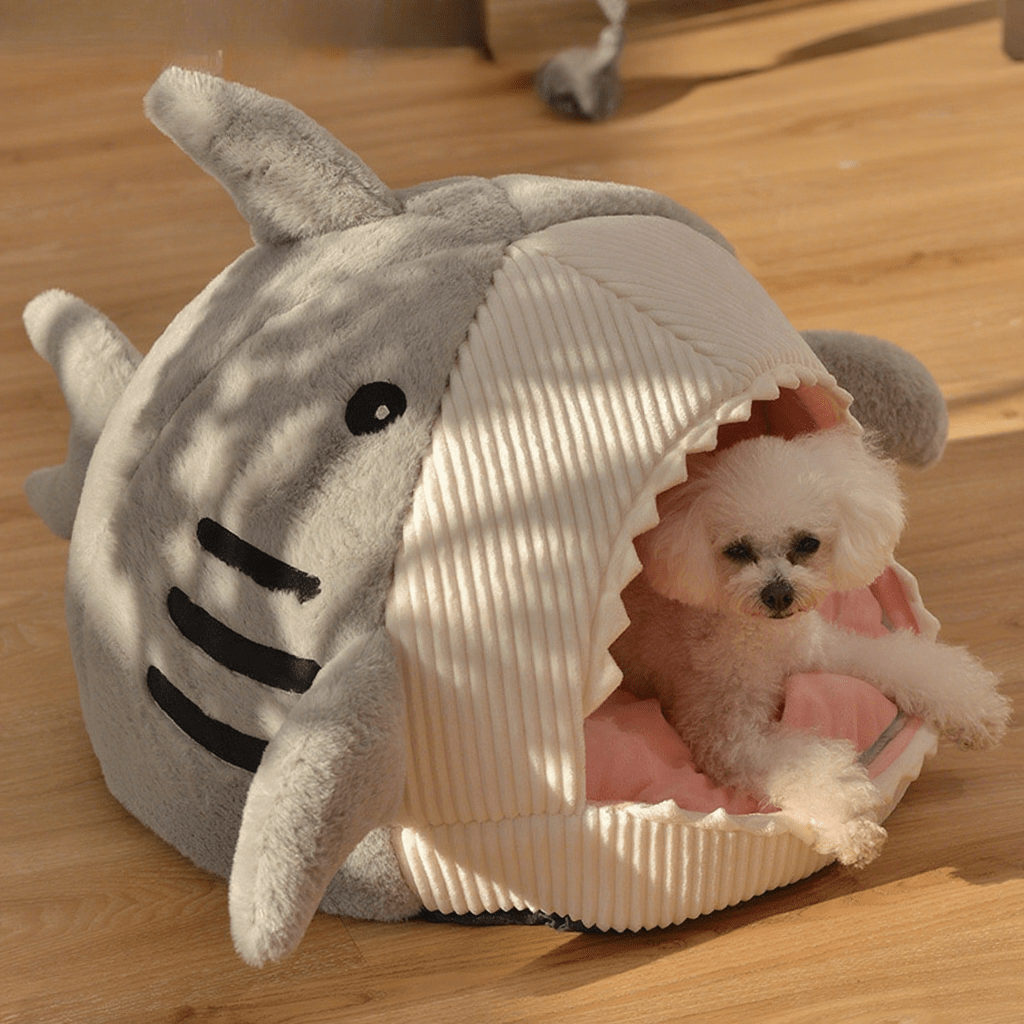 Blue shark-shaped enclosed pet bed nest made of soft polyester fabric for cats and small dogs.