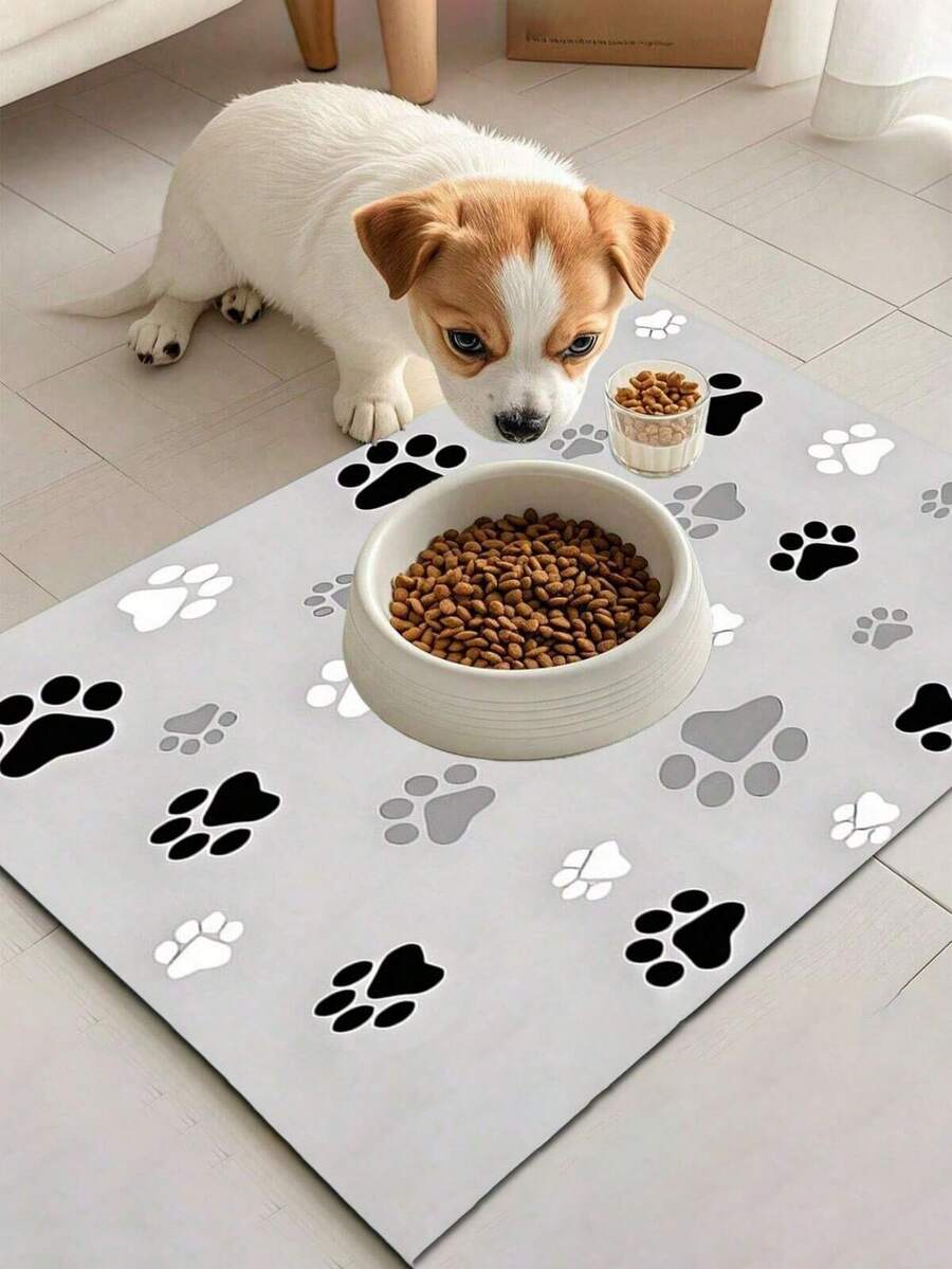 Black and white cartoon diatomite pet feeding mat placed under dog and cat food and water bowls to catch spills.