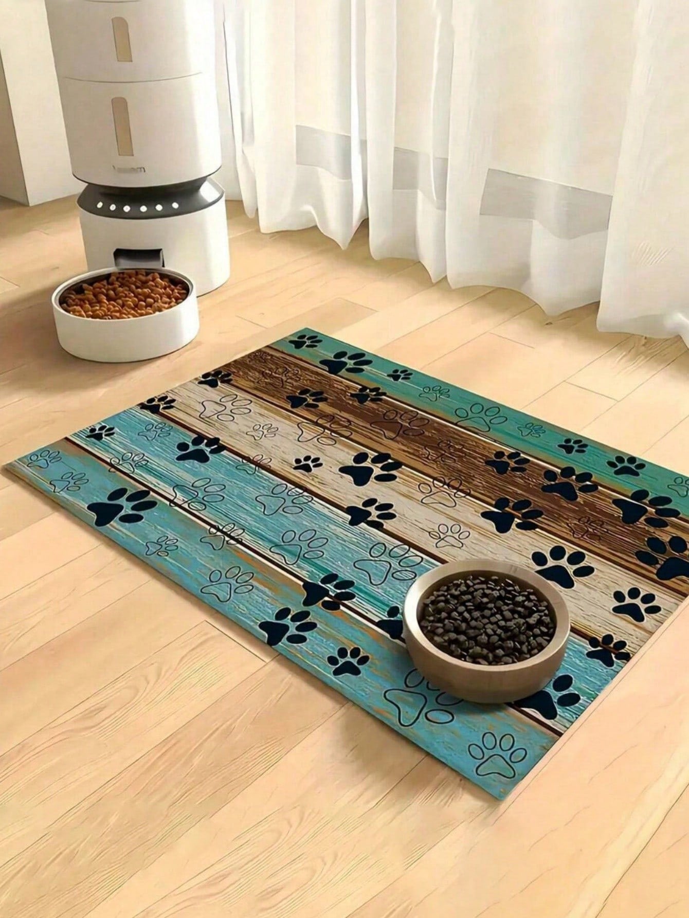 Black and white cartoon diatomite pet feeding mat placed under dog and cat food and water bowls to catch spills.