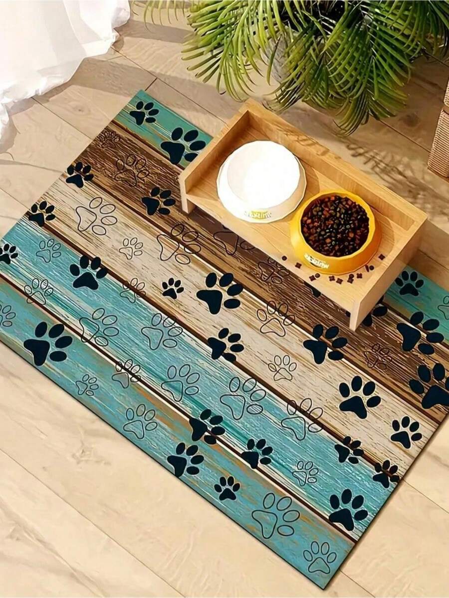 Black and white cartoon diatomite pet feeding mat placed under dog and cat food and water bowls to catch spills.