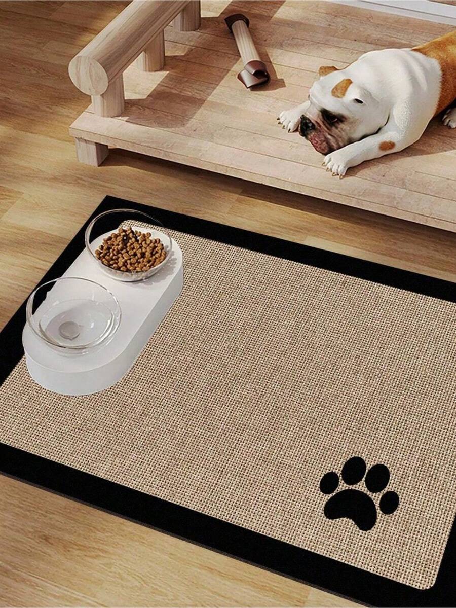 Black and white cartoon diatomite pet feeding mat placed under dog and cat food and water bowls to catch spills.