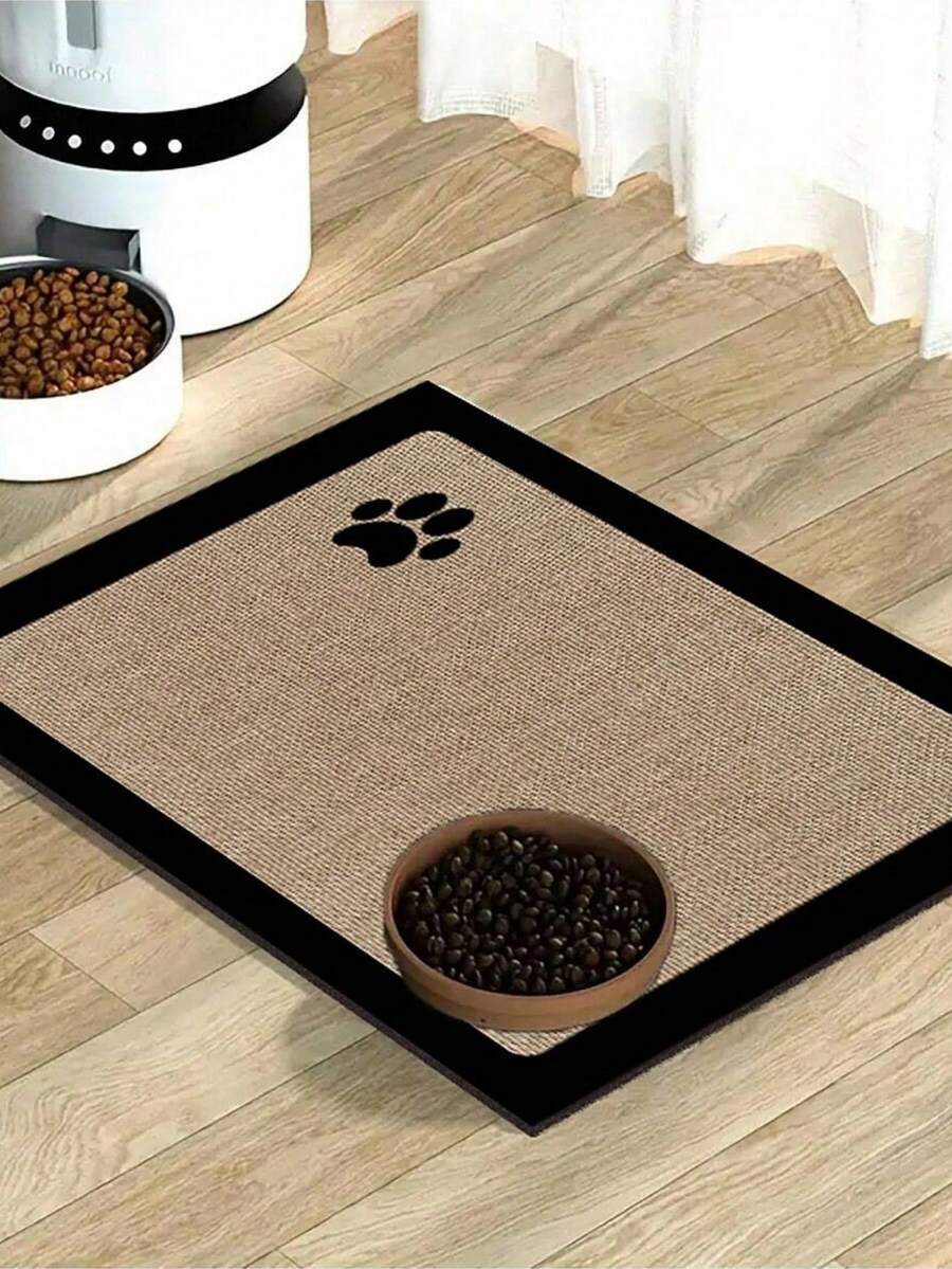 Black and white cartoon diatomite pet feeding mat placed under dog and cat food and water bowls to catch spills.