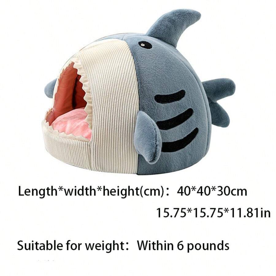 Blue shark-shaped enclosed pet bed nest made of soft polyester fabric for cats and small dogs.