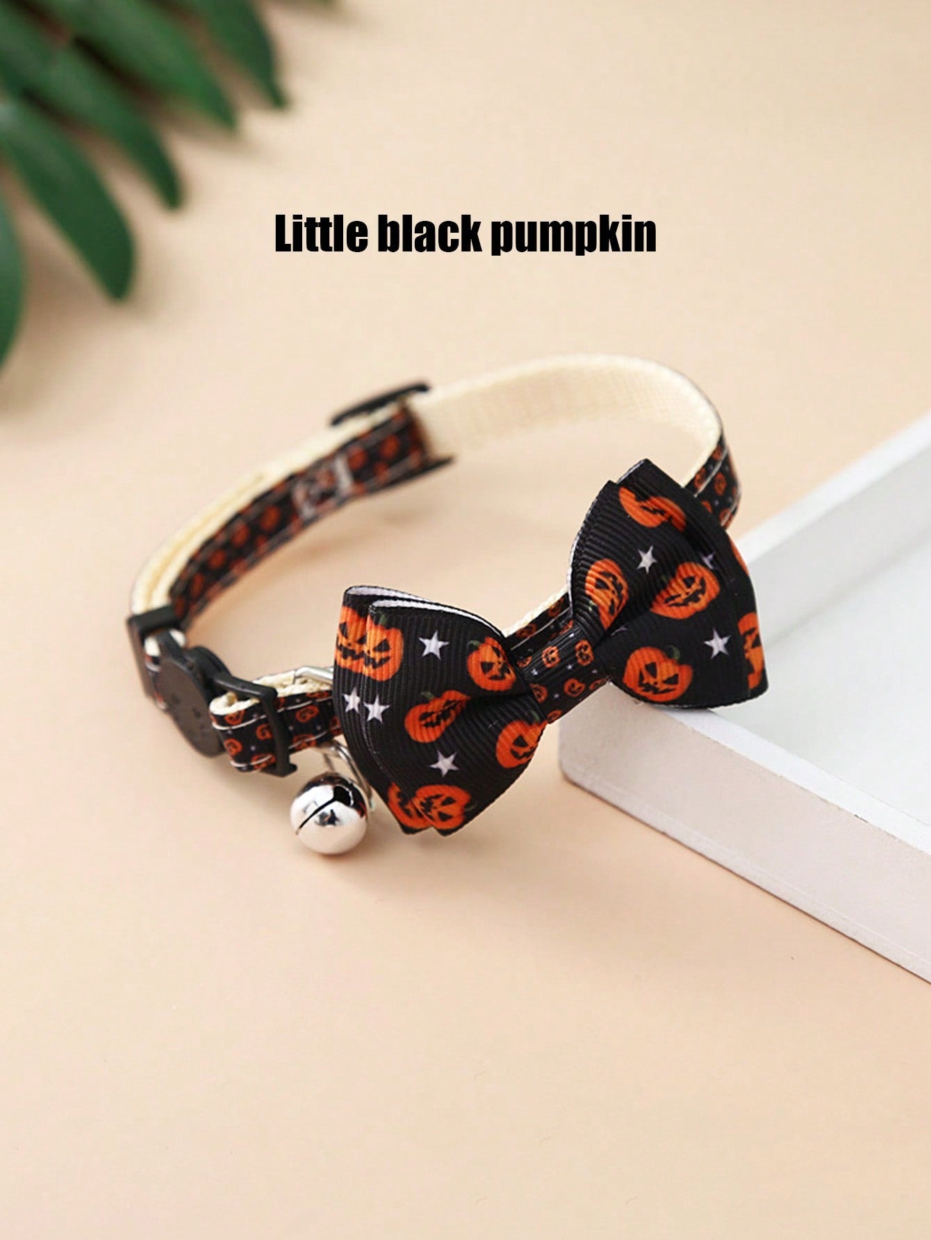 Adjustable multicolor Halloween pet collar with pumpkin pattern, bow, and bell for cats and dogs