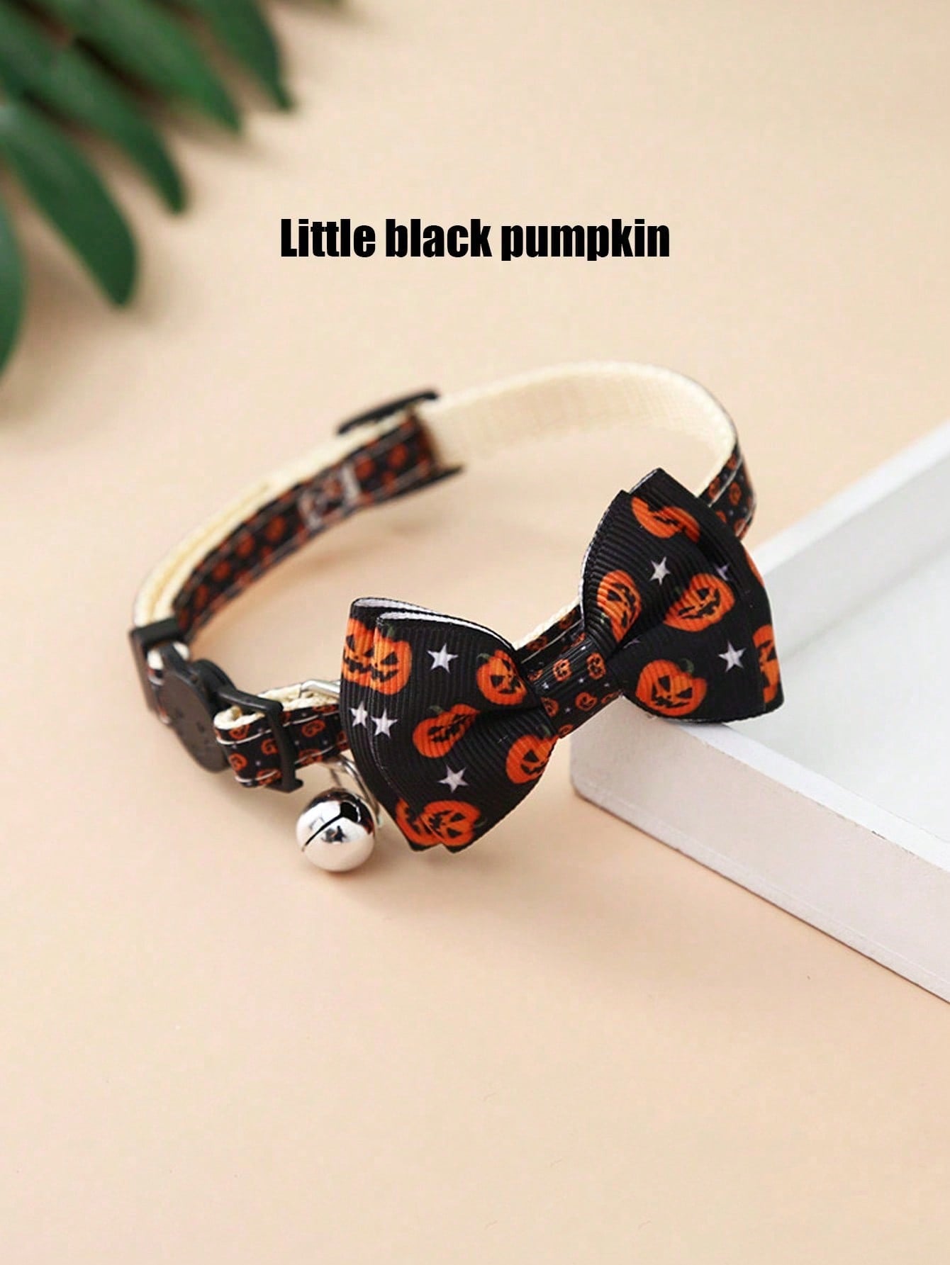 Adjustable multicolor Halloween pet collar with pumpkin pattern, bow, and bell for cats and dogs