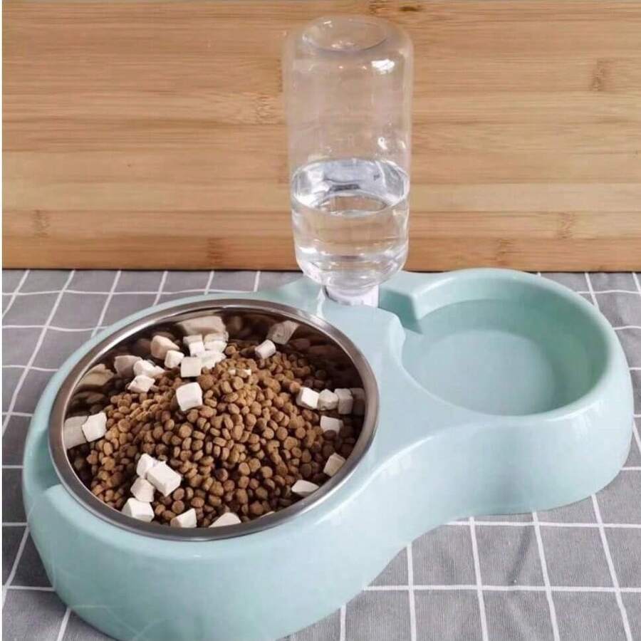 Pink 2-in-1 pet food and water bowl designed for cats and dogs, featuring a durable double bowl structure for feeding and watering.