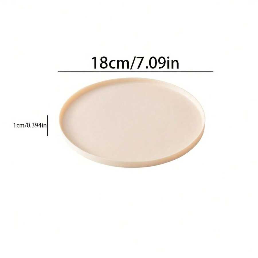 Round multicolor silicone pet food mat with raised edges for cats and dogs.