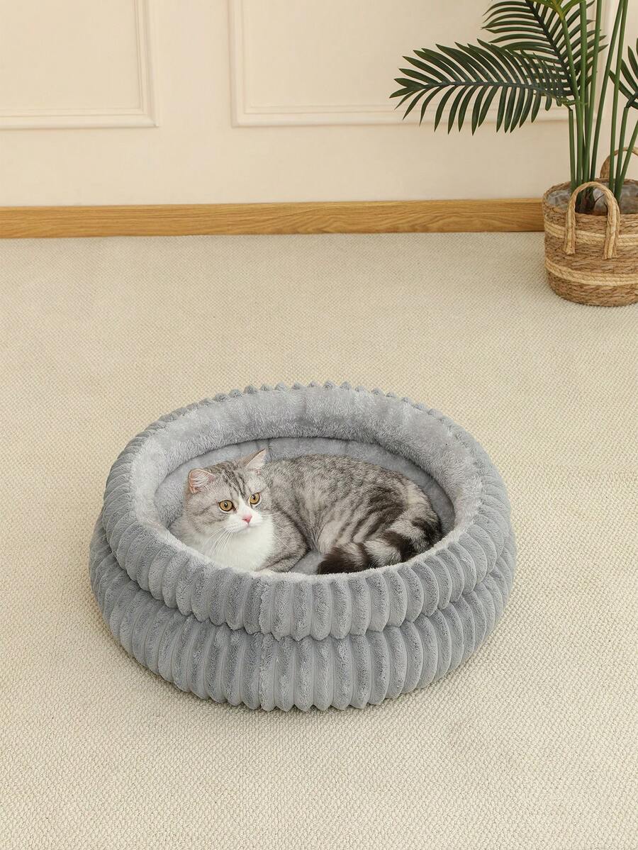 Grey soft fabric cat nest bed filled with comfortable polyester for small, medium, and large cats.