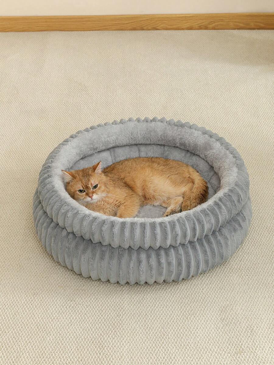 Grey soft fabric cat nest bed filled with comfortable polyester for small, medium, and large cats.