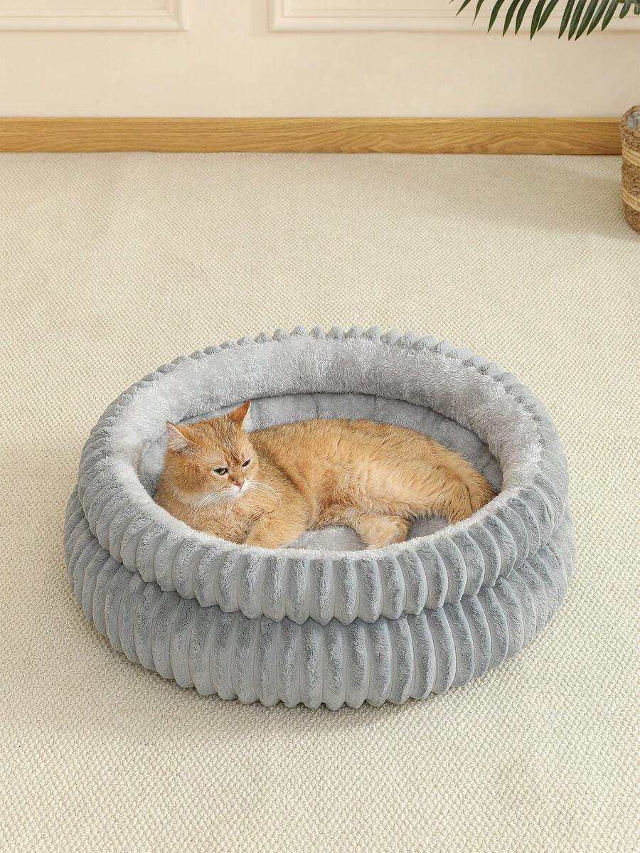 Grey soft fabric cat nest bed filled with comfortable polyester for small, medium, and large cats.