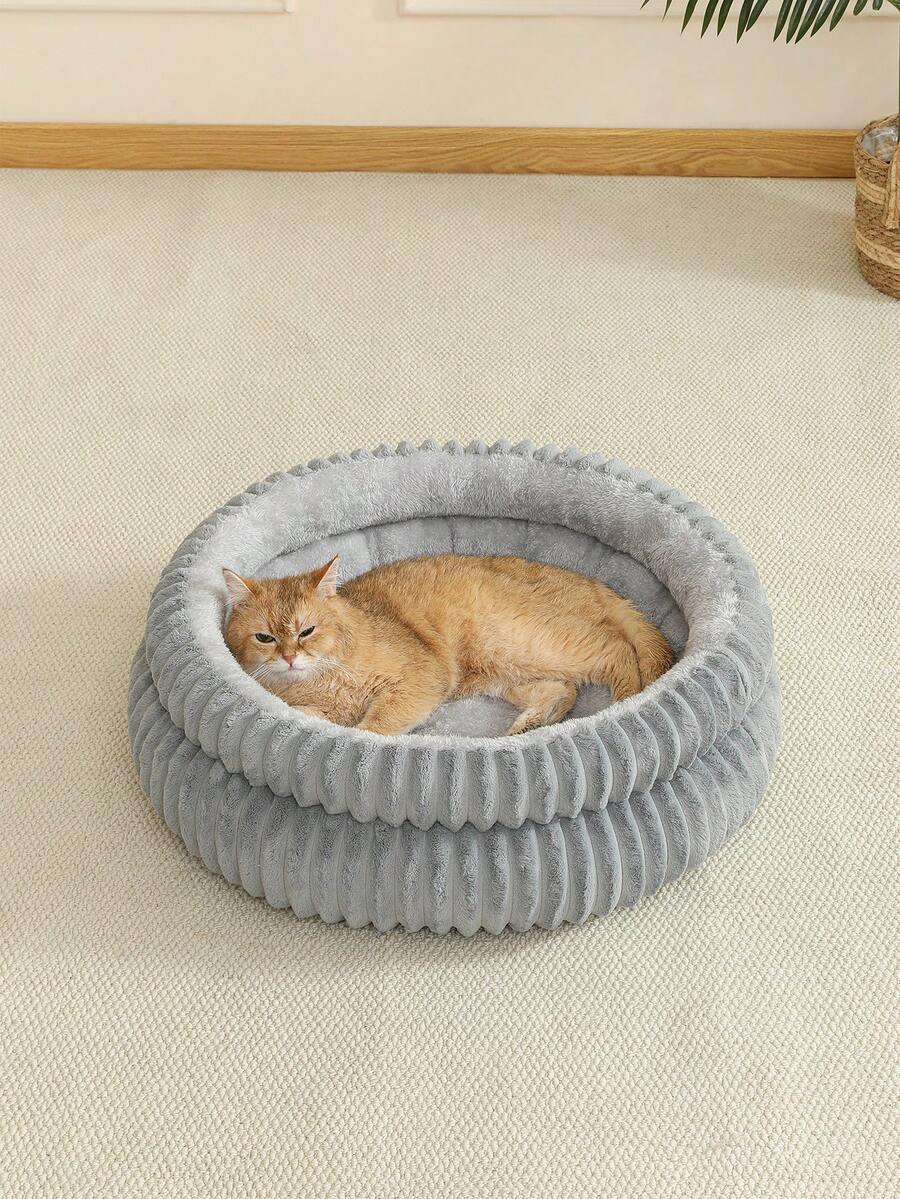 Grey soft fabric cat nest bed filled with comfortable polyester for small, medium, and large cats.