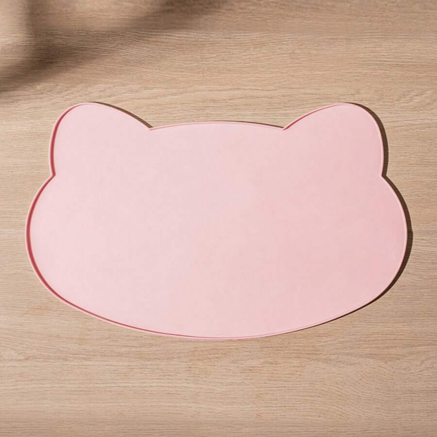 Multicolor silicone pet food mat with cartoon pattern, waterproof non-slip surface, and raised edges for dog and cat bowls.