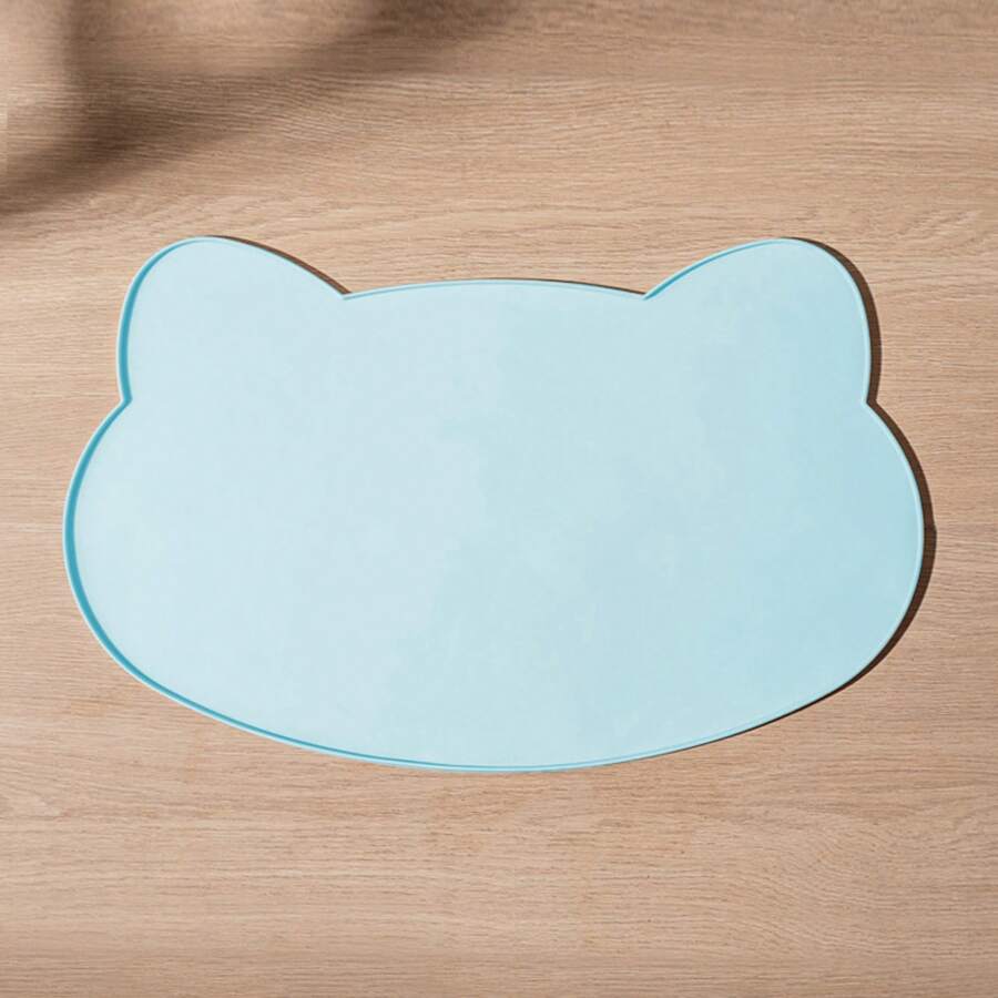 Multicolor silicone pet food mat with cartoon pattern, waterproof non-slip surface, and raised edges for dog and cat bowls.