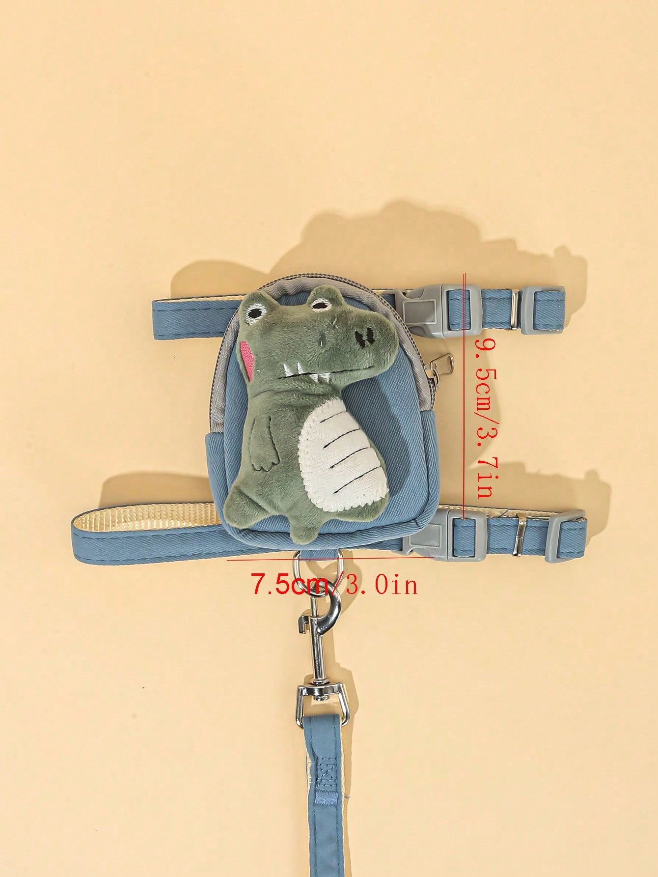 Multicolor plush dinosaur decor pet backpack with collar, harness and leash set for cats and small dogs, designed to carry food or poop bags.