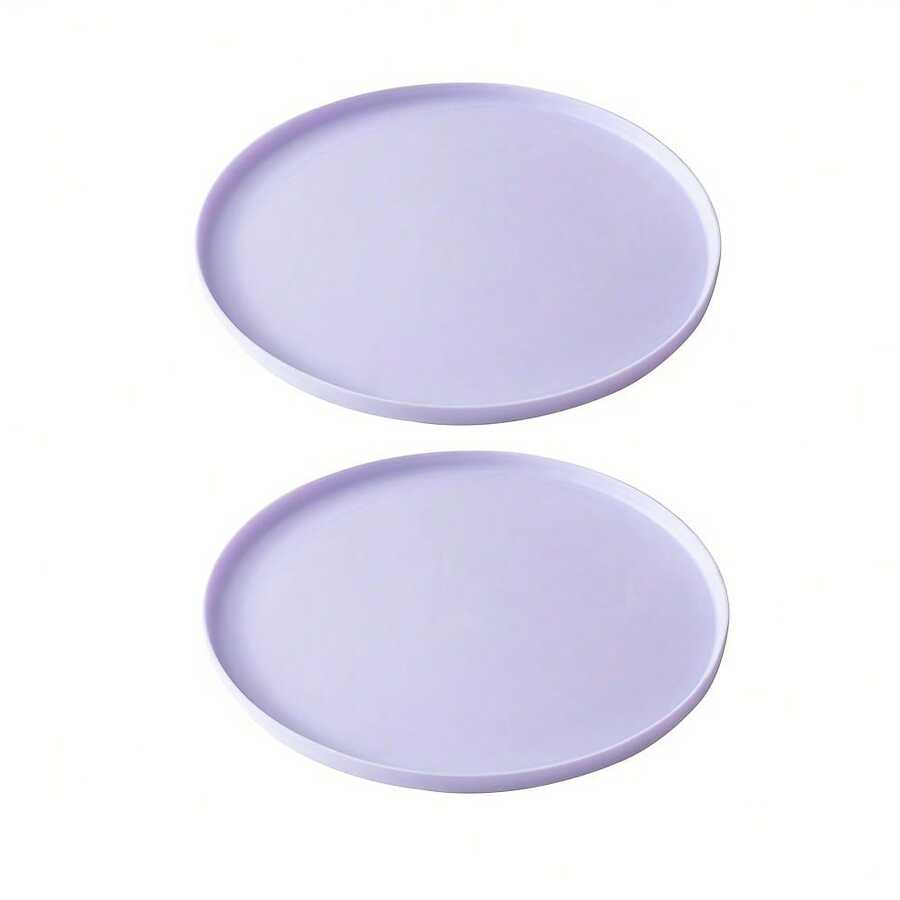 Round multicolor silicone pet food mat with raised edges for cats and dogs.