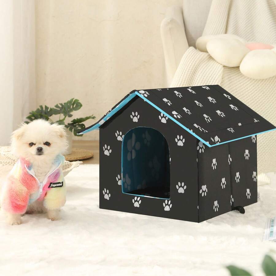 Black house-shaped outdoor waterproof cat bed made of 600D Oxford cloth with high-density foam insulation and a 4-season memory foam cushion.