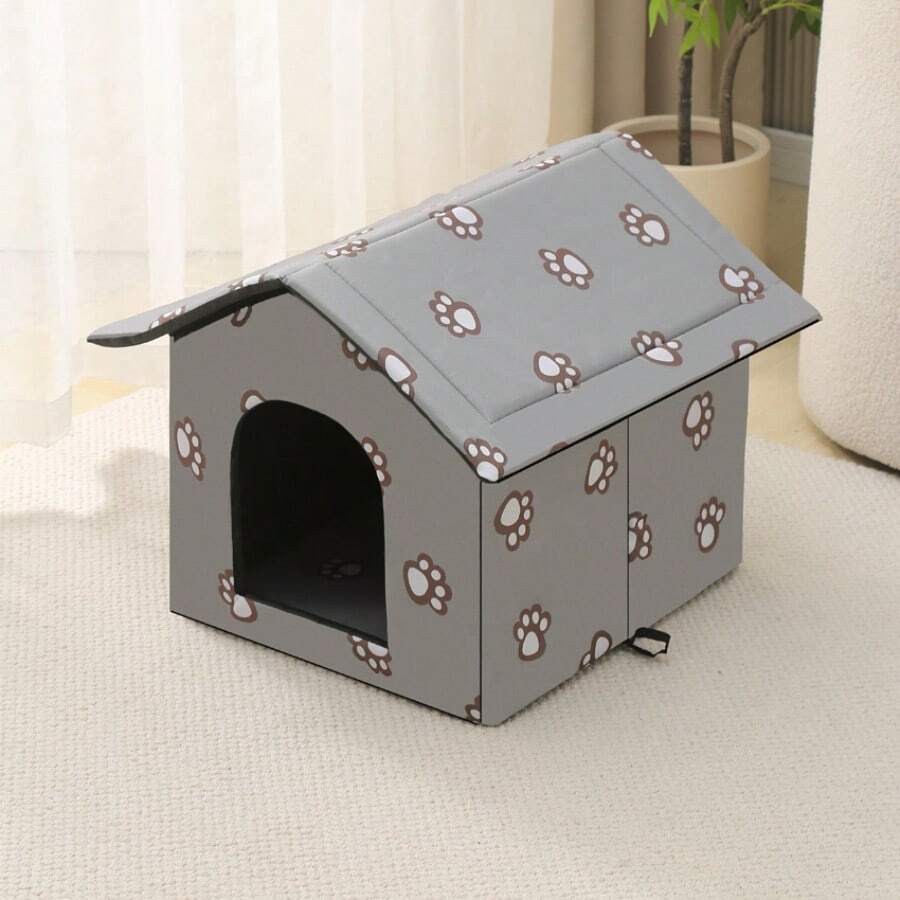 Black house-shaped outdoor waterproof cat bed made of 600D Oxford cloth with high-density foam insulation and a 4-season memory foam cushion.