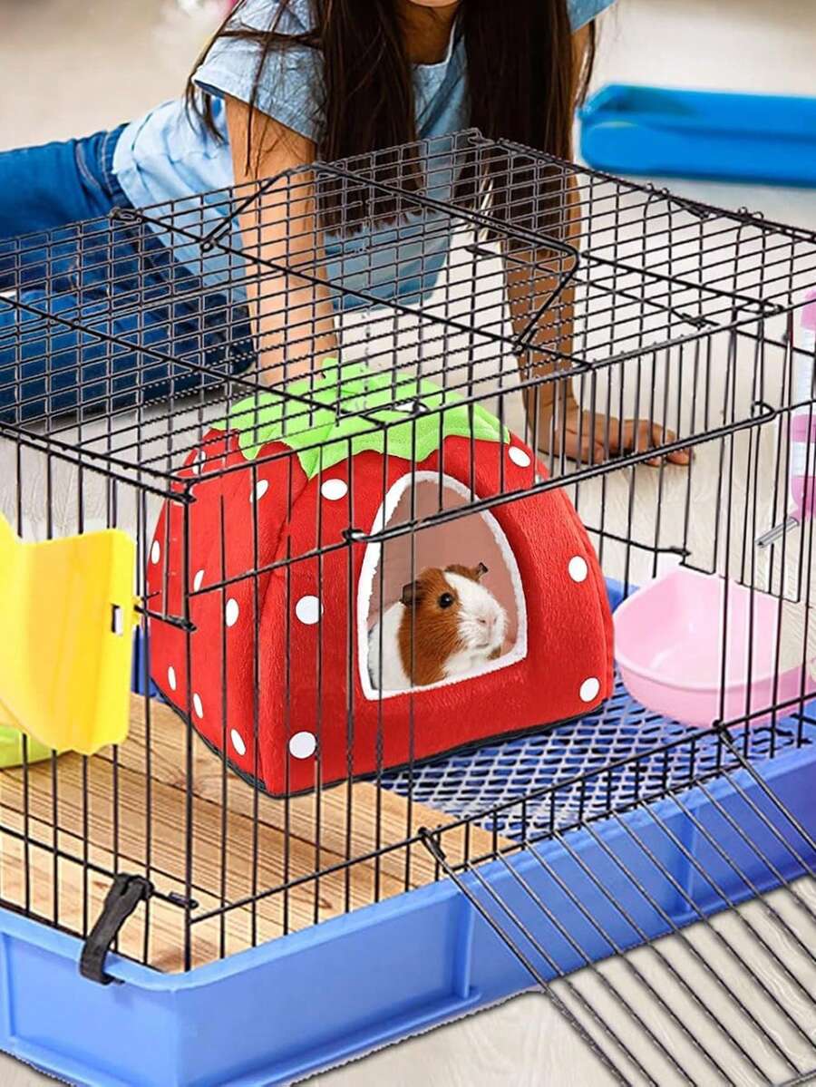 Pink strawberry pattern hamster bed hideaway nest made of soft polyester for small pets.