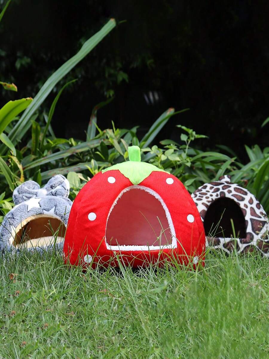Pink strawberry pattern hamster bed hideaway nest made of soft polyester for small pets.