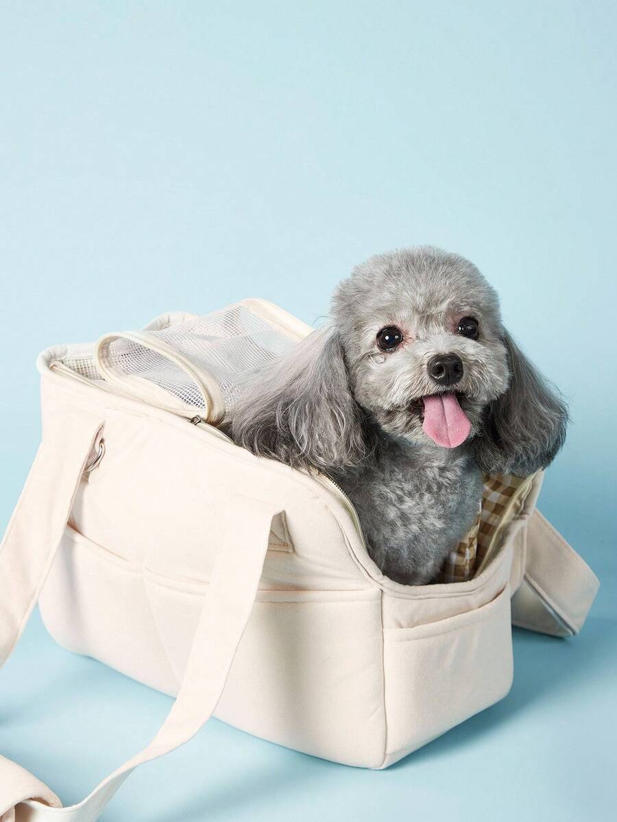Multicolor breathable pet shoulder carry bag and portable crossbody dog and cat carrier made of 100% polyester.