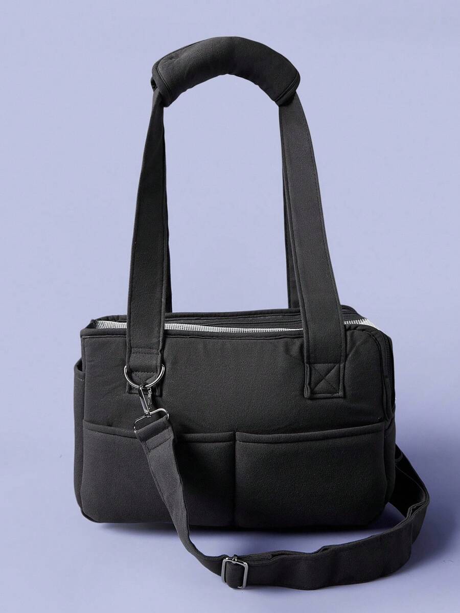 Multicolor breathable pet shoulder carry bag and portable crossbody dog and cat carrier made of 100% polyester.