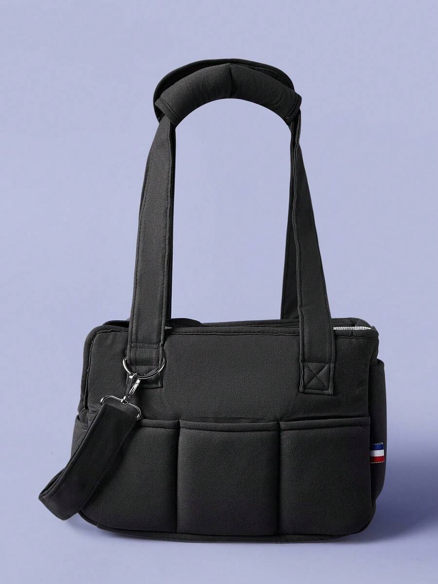 Multicolor breathable pet shoulder carry bag and portable crossbody dog and cat carrier made of 100% polyester.