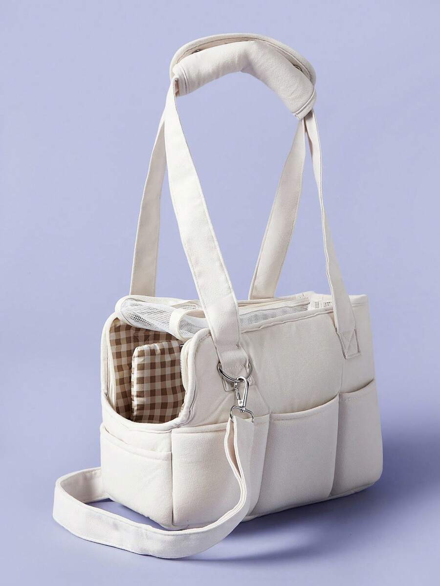 Multicolor breathable pet shoulder carry bag and portable crossbody dog and cat carrier made of 100% polyester.