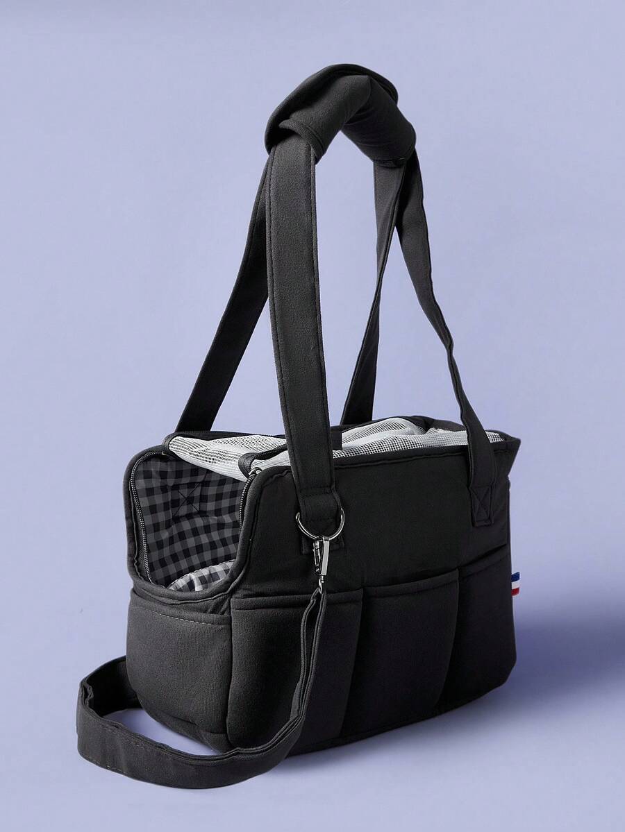 Multicolor breathable pet shoulder carry bag and portable crossbody dog and cat carrier made of 100% polyester.
