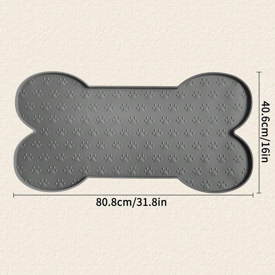 Multicolor bone-shaped silicone pet feeding mat with high spill-proof edge for cat and dog food and water bowls.