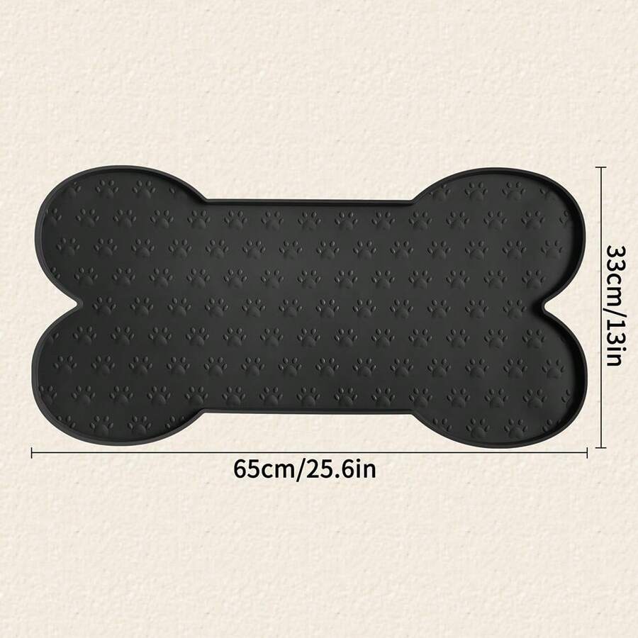 Multicolor bone-shaped silicone pet feeding mat with high spill-proof edge for cat and dog food and water bowls.