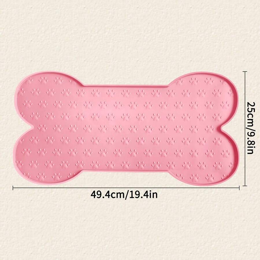 Multicolor bone-shaped silicone pet feeding mat with high spill-proof edge for cat and dog food and water bowls.