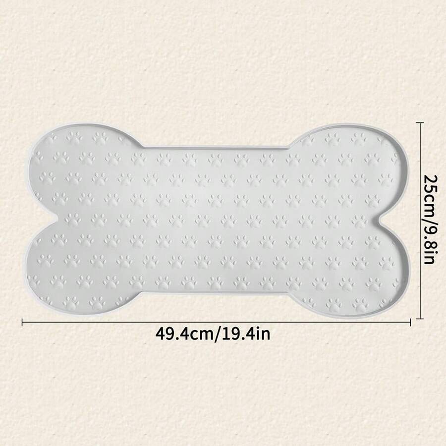 Multicolor bone-shaped silicone pet feeding mat with high spill-proof edge for cat and dog food and water bowls.